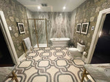Infinity rope chain marble mosaic flooring installation layout in a high-end residence.