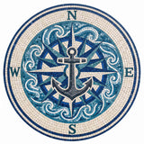 Handcrafted round nautical marble mosaic medallion featuring a central anchor over a compass rose with cobalt blue ocean waves and cardinal N S E W letters.