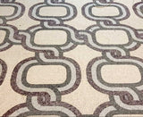 Grand luxury entry floor custom laid with Mediterranean infinity rope chain marble mosaic pattern in white, gray, and terracotta red colors.