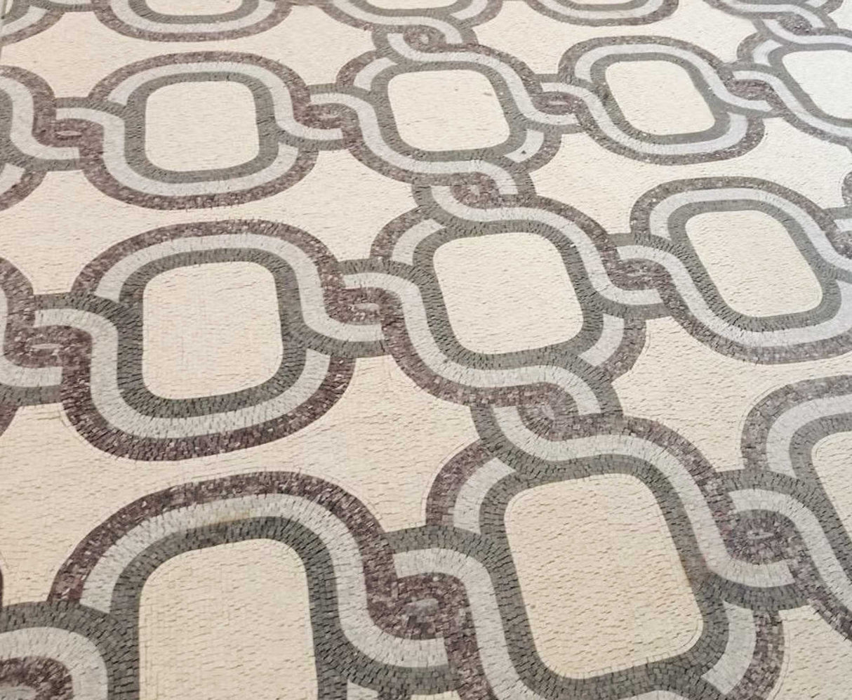 Grand luxury entry floor custom laid with Mediterranean infinity rope chain marble mosaic patter