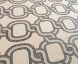 Grand luxury entry floor custom laid with Mediterranean infinity rope chain marble mosaic patter