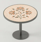 Handcrafted round marble mosaic tabletop featuring a central lotus flower motif with terracotta petals and green leaves on a cream background.