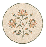 A circular mosaic tile design featuring three stylized lotus flowers and leaves in warm orange, beige, and muted green tones, centered on a light cream background with a dark green outer border.
