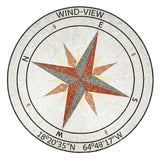 A circular compass rose mosaic design with a central eight-pointed star in rust red, gray, and pale yellow, surrounded by black navigational markings and bespoke estate name at the top, on a white background.